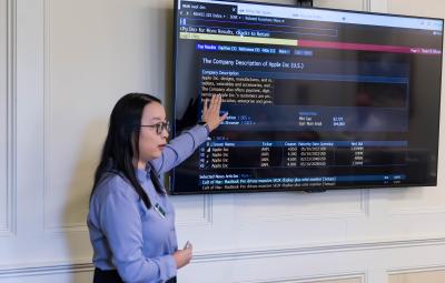 A Finance professor shows off the Bloomberg trading module