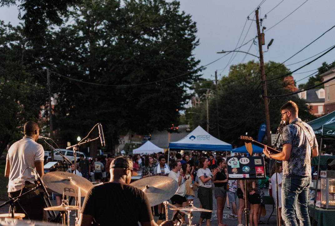 A band performs at the Block Party